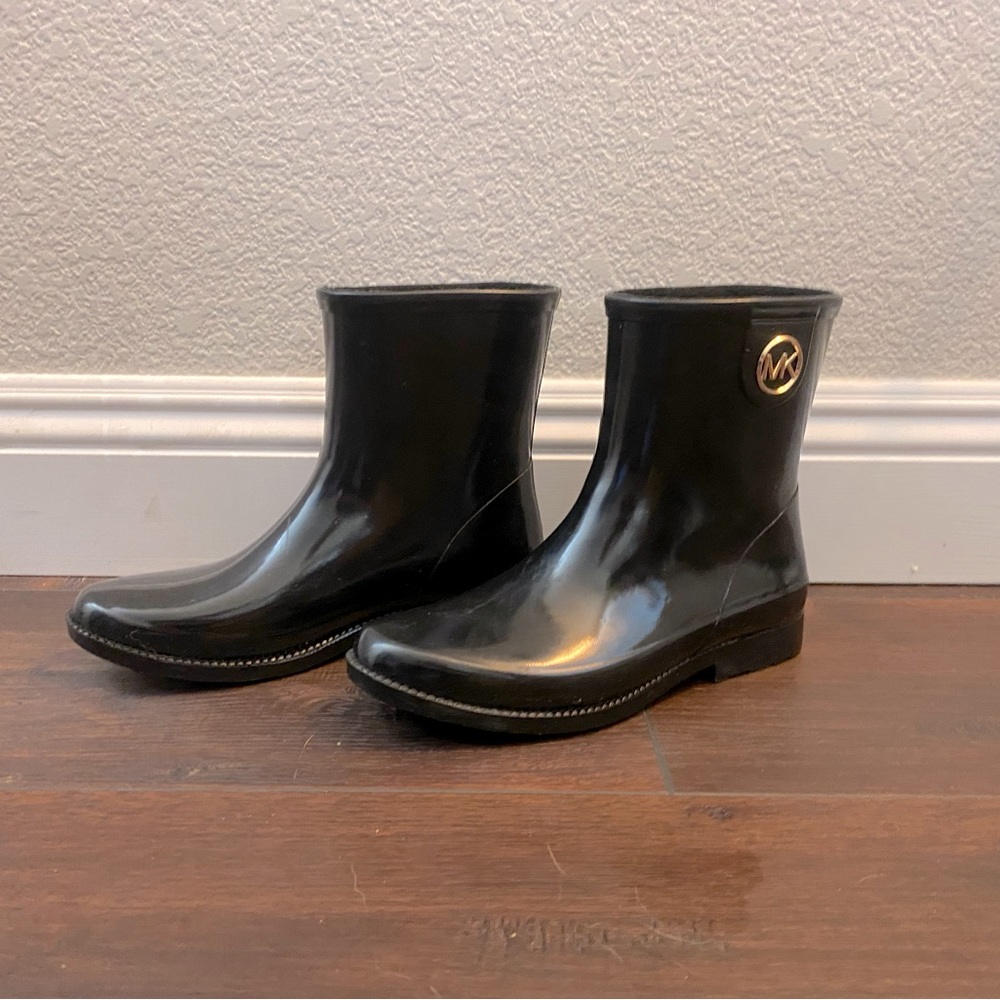 Michael Kors ankle height rain boots.